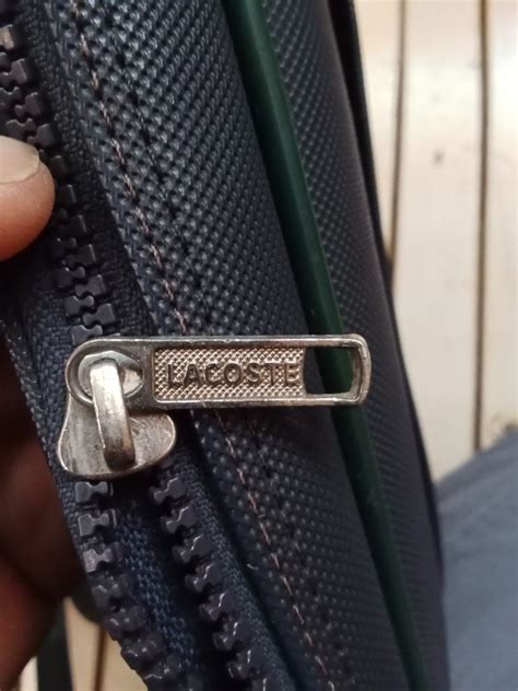 how to spot fake lacoste sling bag|lacoste bag stitching.